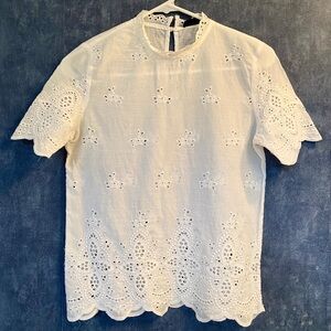 Cotton eyelet blouse.